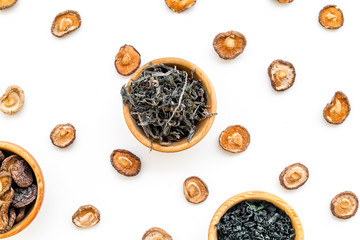 weeds, mushrooms in bowl pattern to cook Chinese and Japanese food on white background top view