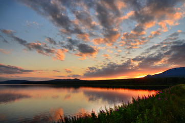 Fototapeta na wymiar Mountains of the southern Urals in summer. Sunset on lake Zyuratkul.