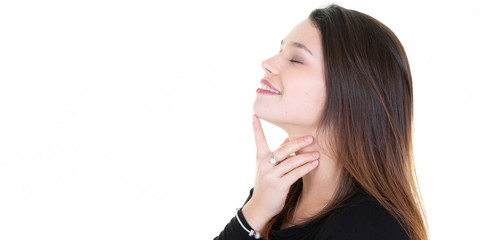Beautiful young woman cares for the neck