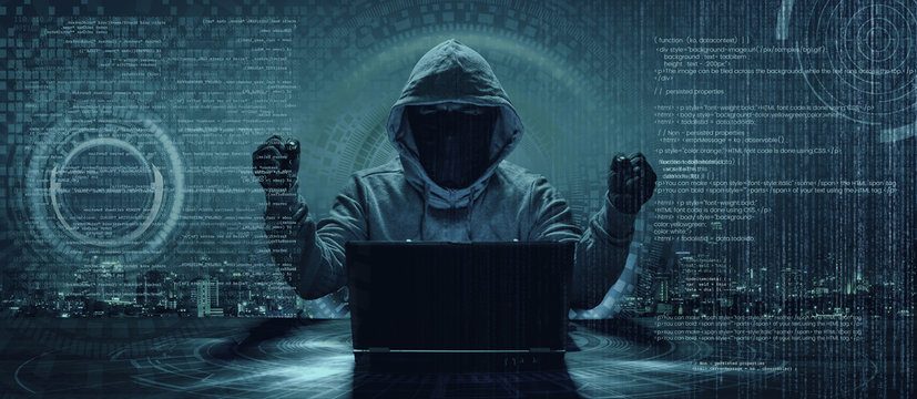 Internet crime concept. Hacker working on a code on dark digital background