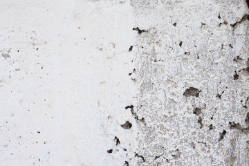Stone wall with clay and whitewashed background texture