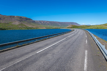 So called Ring Road along Lake Ljosavatn in north part of Iceland