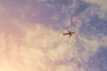Naklejka na ściany i meble Airplane in the sky