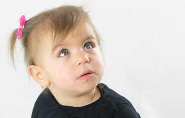 Portrait of a little girl with green eyes