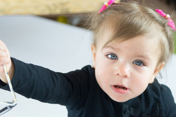 Portrait of a little girl with green eyes