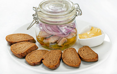 Croutons with pickled herring.
