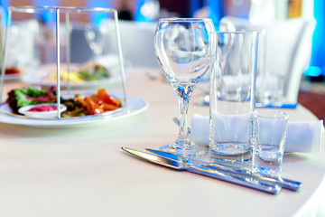 table setting with cutlery and glass