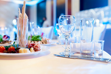 table setting with cutlery and glass