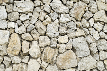 Old rural stone wall closeup