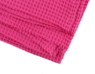 Pink corrugated cotton textile - close up of fabric texture. Cotton Fabric Texture. Pink Clothing Background. Text Space. Abstract background and texture for designers.