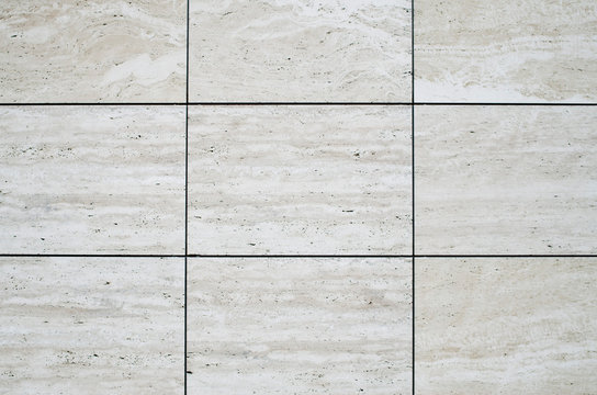 New polished stone cladding on wall closeup