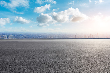 Shanghai city skyline and empty asphalt road scenery,China