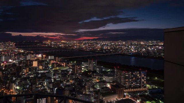 Time lapse 4k video of Osaka City View at sunset from Umeda Sky Building  in Kansai region, Japan.