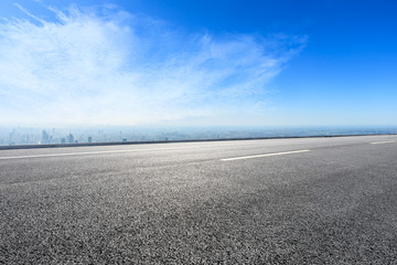 Shanghai city skyline and empty asphalt road scenery,China
