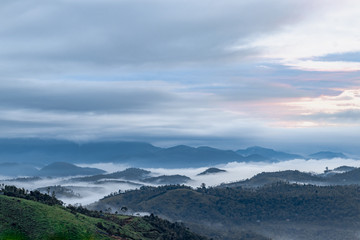 Magical cloud kissing hill top