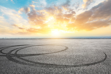 Shanghai city skyline and asphalt race track ground at sunrise,high angle view