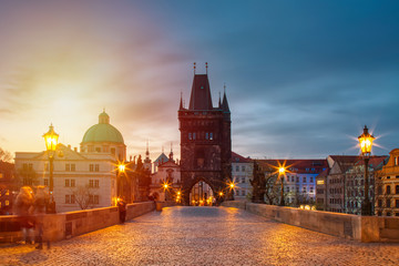 View of Charles Bridge in Prague during sunset, Czech Republic. The world famous Prague landmark.