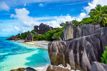 rocks,white sand,palms,turquoise water at tropical beach,la dique,seychelles paradise 16