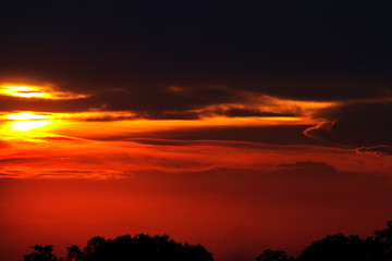 Obraz premium sunset with dramatic clouds.