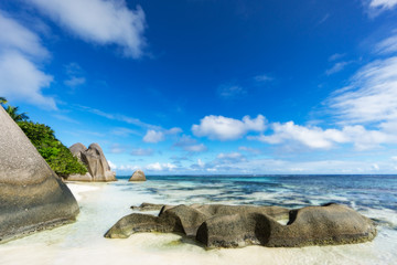 rocks,white sand,palms,turquoise water at tropical beach,la dique,seychelles paradise 12