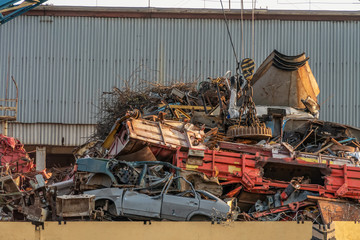 crane grab loading scrap metal. industry concept. Delivery of scrap metal