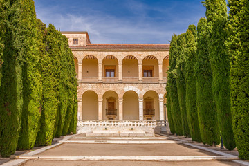 Infantado Palace garden in Guadalajara, Spain. Elizabethan Gothic style building with Renaissance...