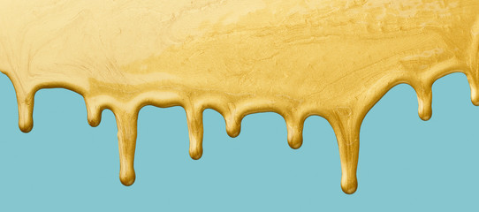 Golden paint dripping
