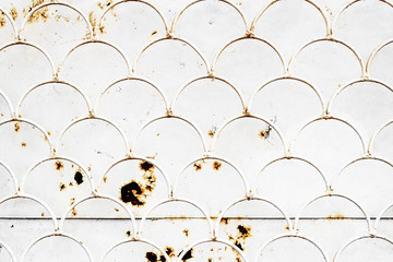 white iron grill with fish scale pattern © nucia