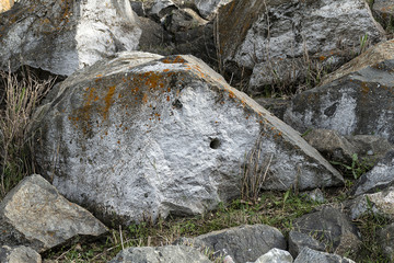 hole formed in the rock, large boulders, hole and cavity in large rocks