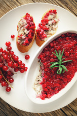 hot smoked mackerel rillettes with confieture of red currants, rosemary, and white wine. toned. 