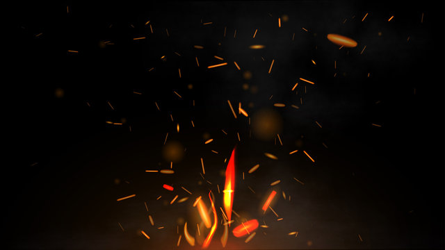 Fire flying sparks on a black background