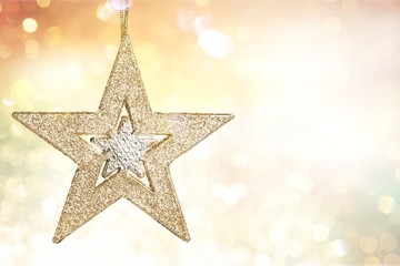 Golden Christmas star decoration on background