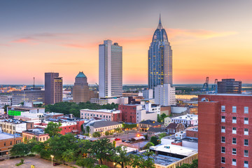 Mobile, Alabama, USA downtown skyline at dusk.