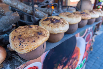 Clay pots for the Turkish Testi Kebab traditional Turkish cuisine restaurant dish and fire.