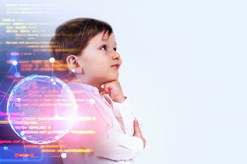 Little boy thinking about programming