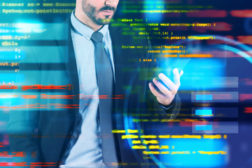 Man with smartphone, code interface