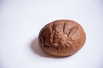 black bread on white background