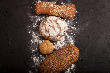 Assortment of baked goods on dark background