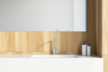 Wooden bathroom interior with sink