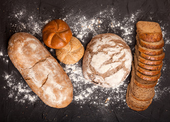 Assortment of baked goods on dark background