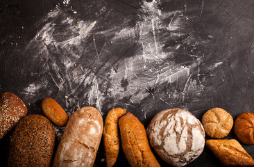 Assortment of baked goods on dark background
