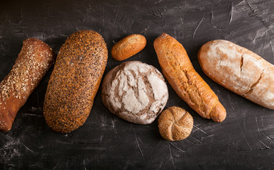 Assortment of baked goods on dark background