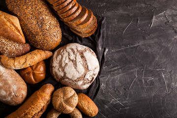 Assortment of baked goods on dark background