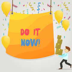 Conceptual hand writing showing Do It Now. Concept meaning not hesitate and start working or doing stuff right away Man Carrying Pile of Boxes with Tarpaulin in Center Balloons
