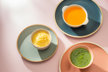 Homemade vegetable baby food purees in glass jars