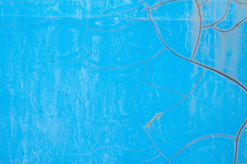 Blue old cracked rusty damaged painted metal background texture close-up