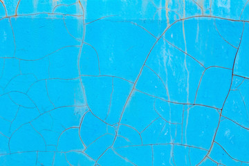 Blue old cracked rusty damaged painted metal background texture close-up