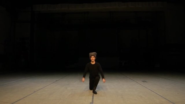 Guy dancing with swords