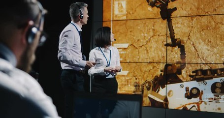 Technicians overviewing Mars landing