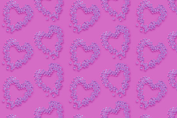 heart shaped crystals on pink paper background. heart or concept of love. Anniversary concept I Love You letters, close up, top view